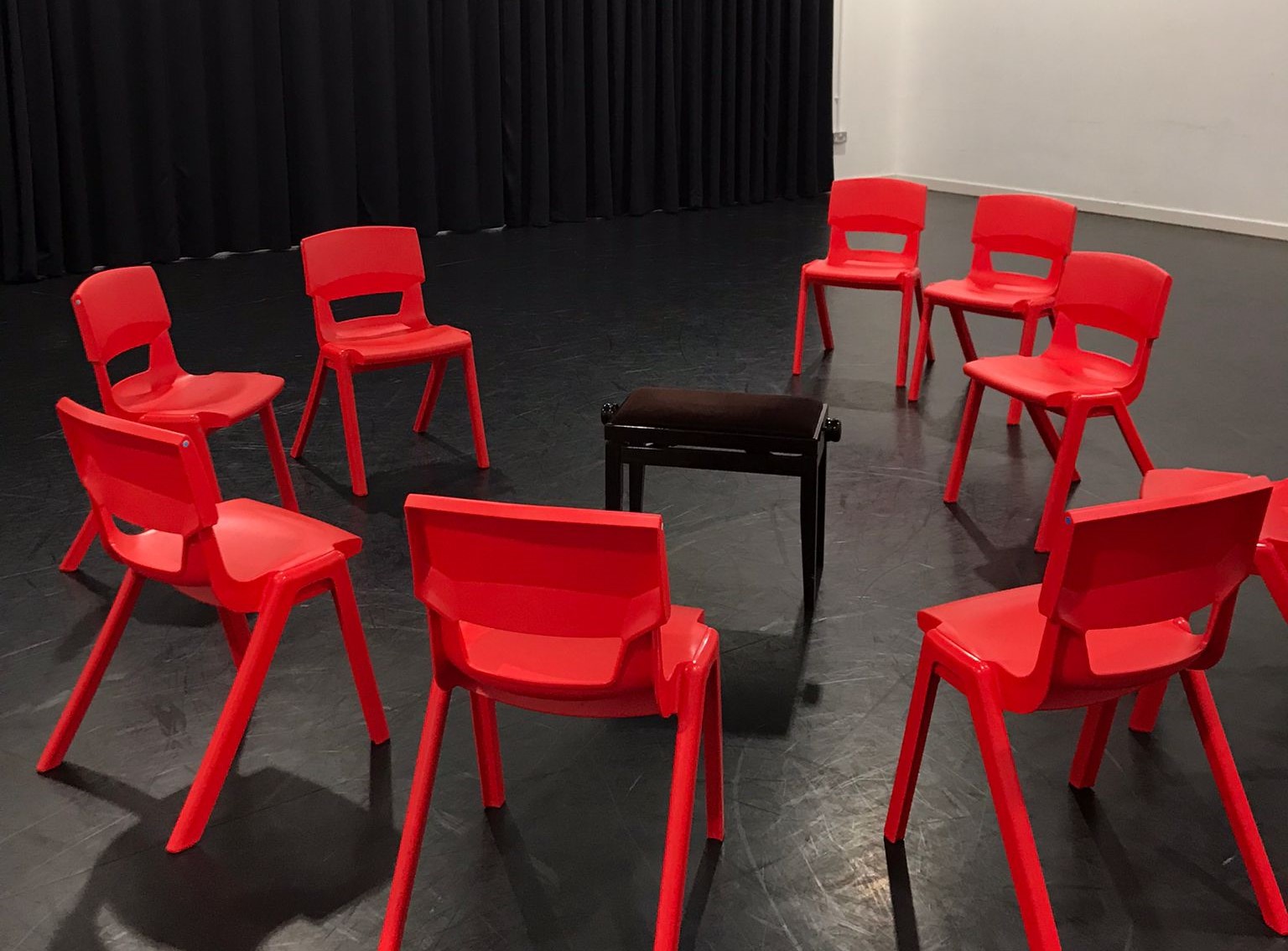 Photo of a circle of chairs to be used for a focus group