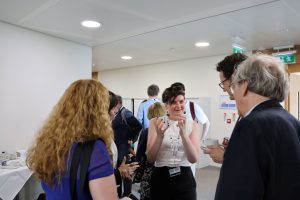 Participants chatting together in between sessions.