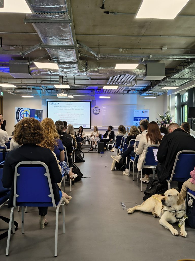 Audience listening to a presentation.