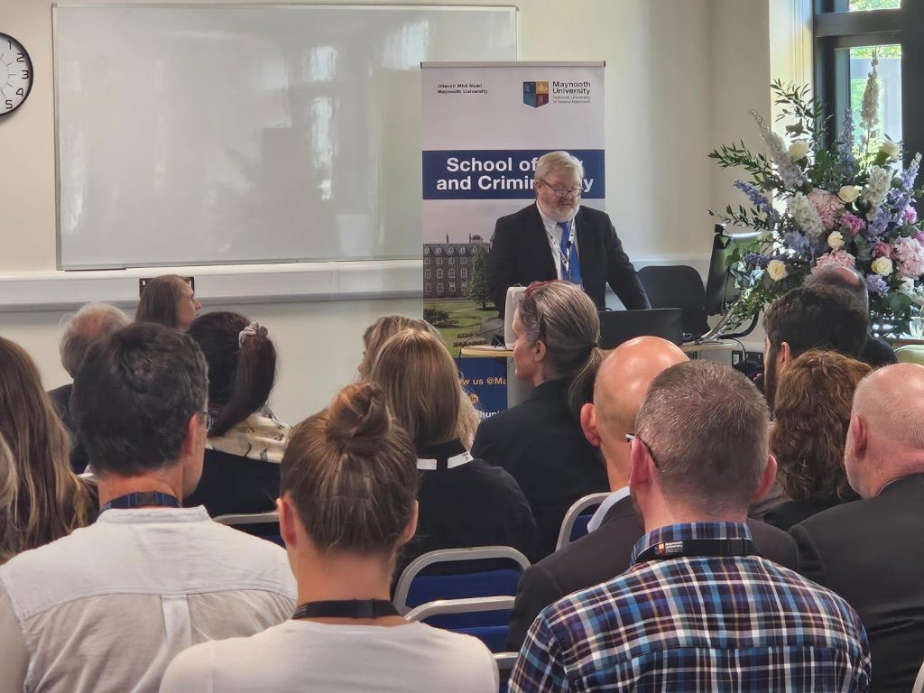 Head of School of Law and Criminology, Prof. Fergus Ryan delivering a speech.